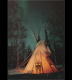 Canvas tipi against the Northern lights at night