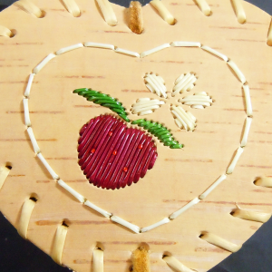 Small heart shaped birch bark basket with purple berry quill design